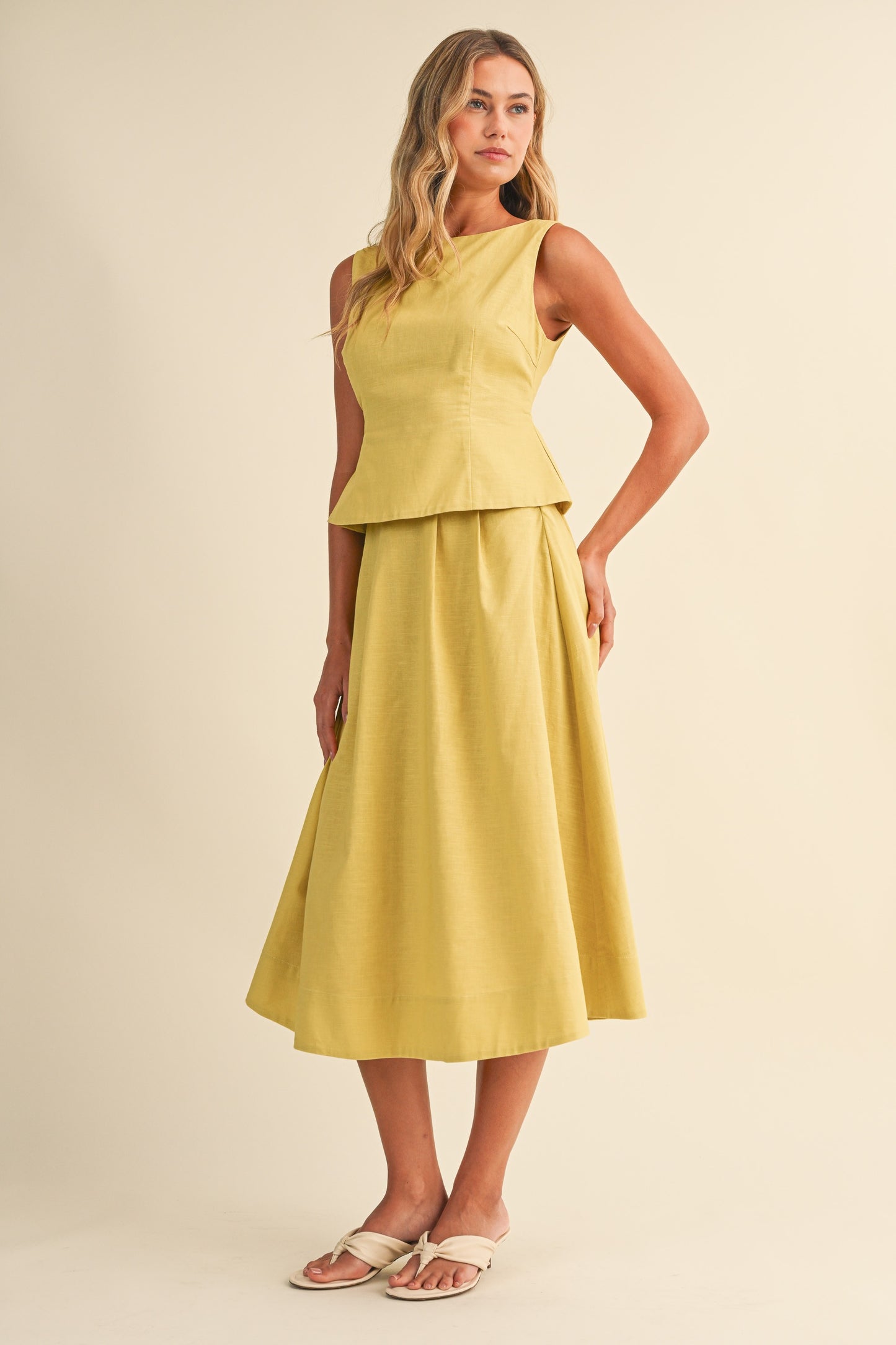2575 Yellow Peplum Top & Pleated Skirt Set