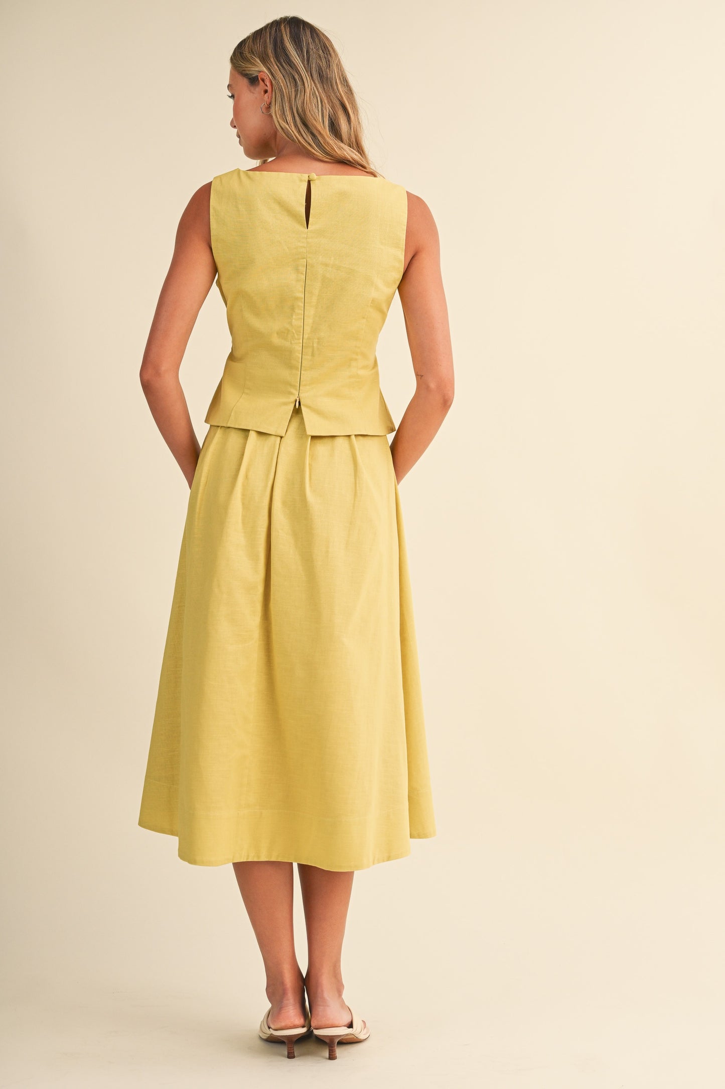 2575 Yellow Peplum Top & Pleated Skirt Set