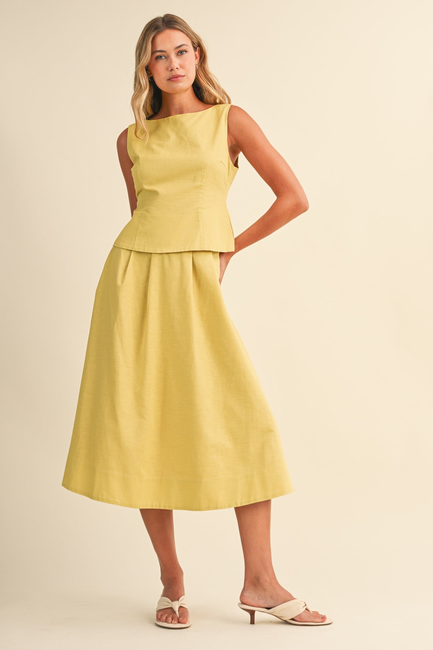 2575 Yellow Peplum Top & Pleated Skirt Set